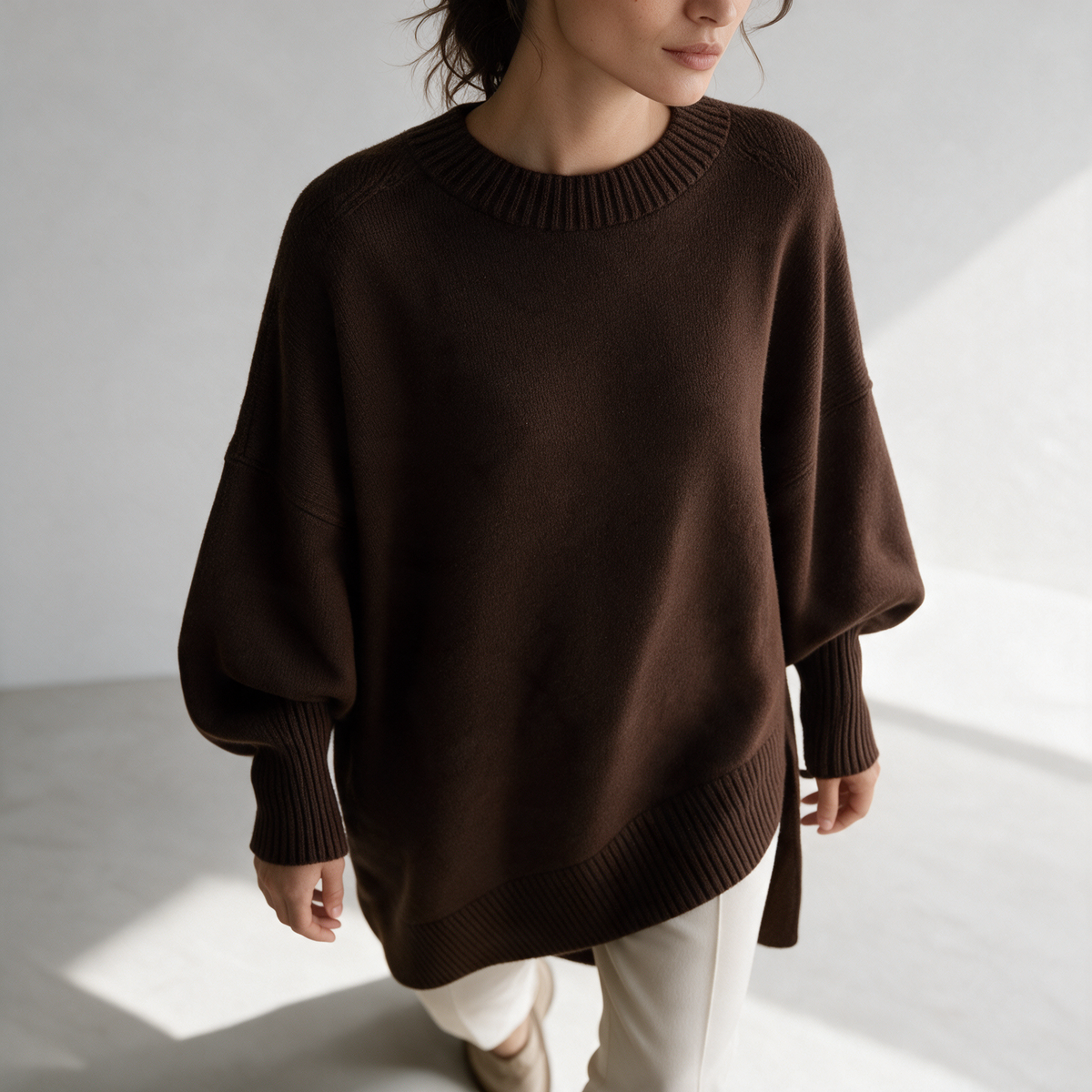 Brown oversized crewneck sweater detail