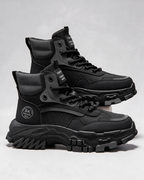 Black mesh-panel lace-up boot — construction