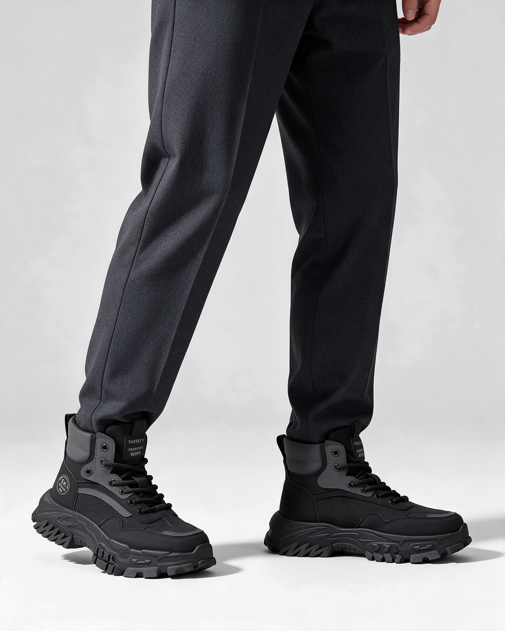 Black mesh-panel lace-up boot — wearing