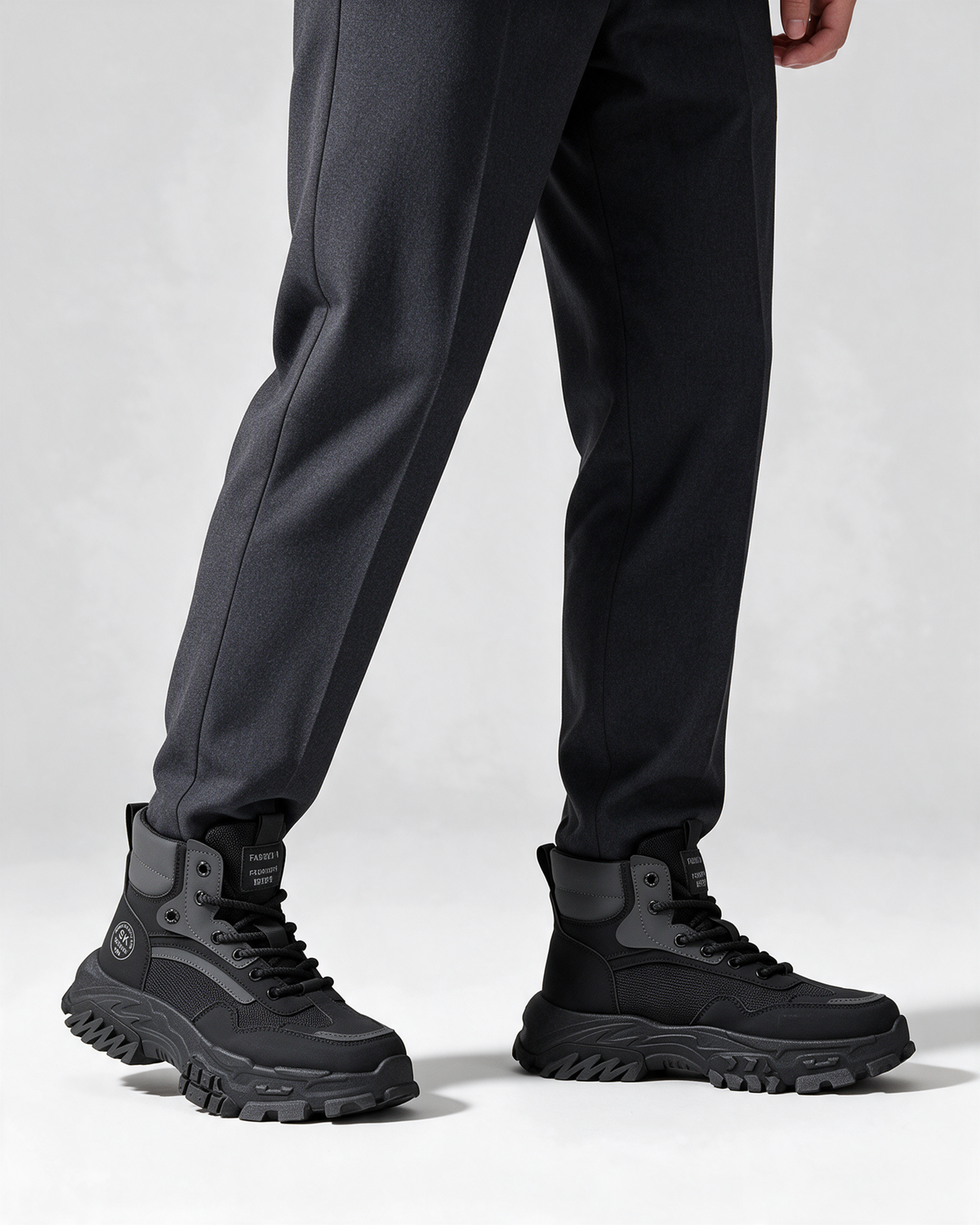 Black mesh-panel lace-up boot — wearing
