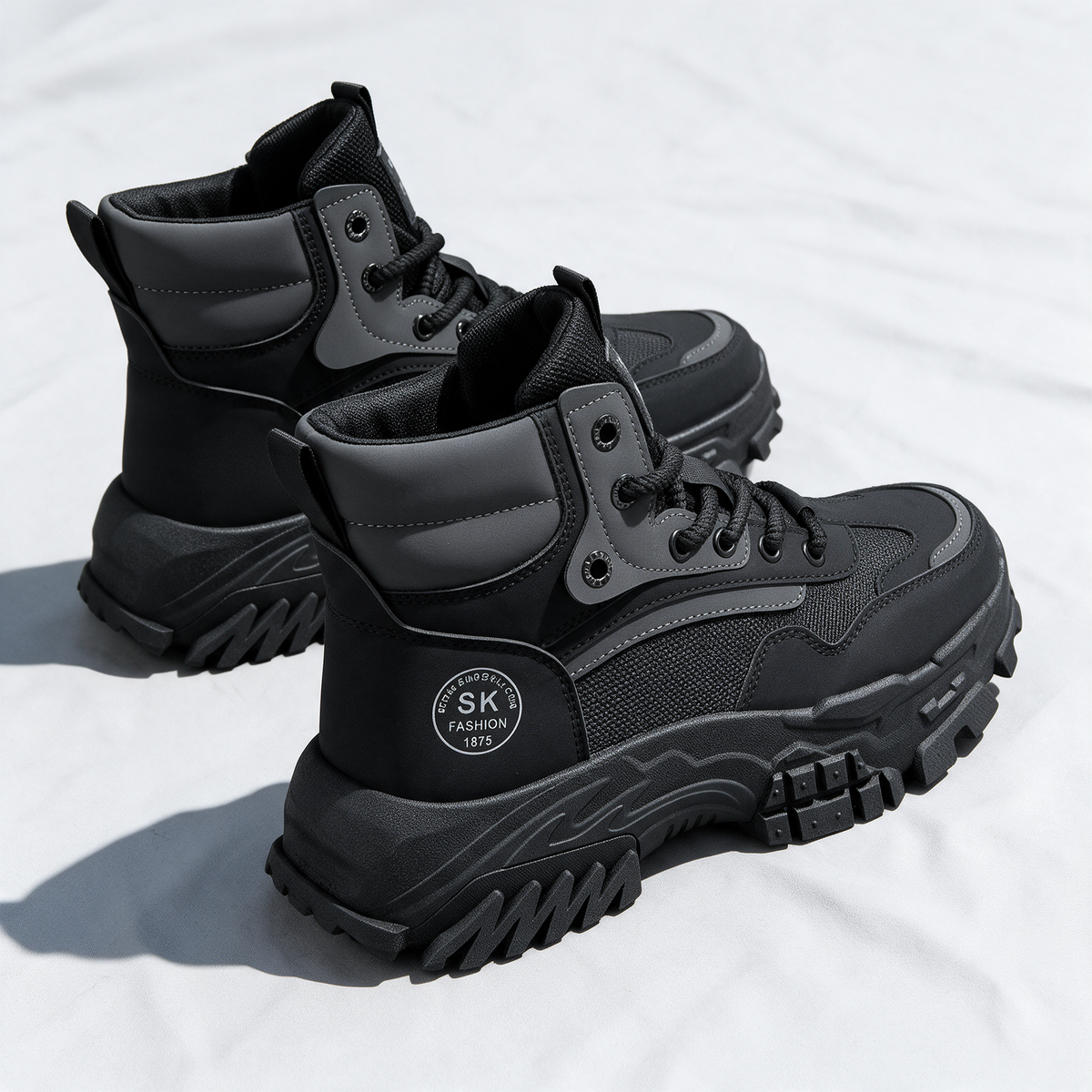 Black mesh-panel lace-up boot — feature1