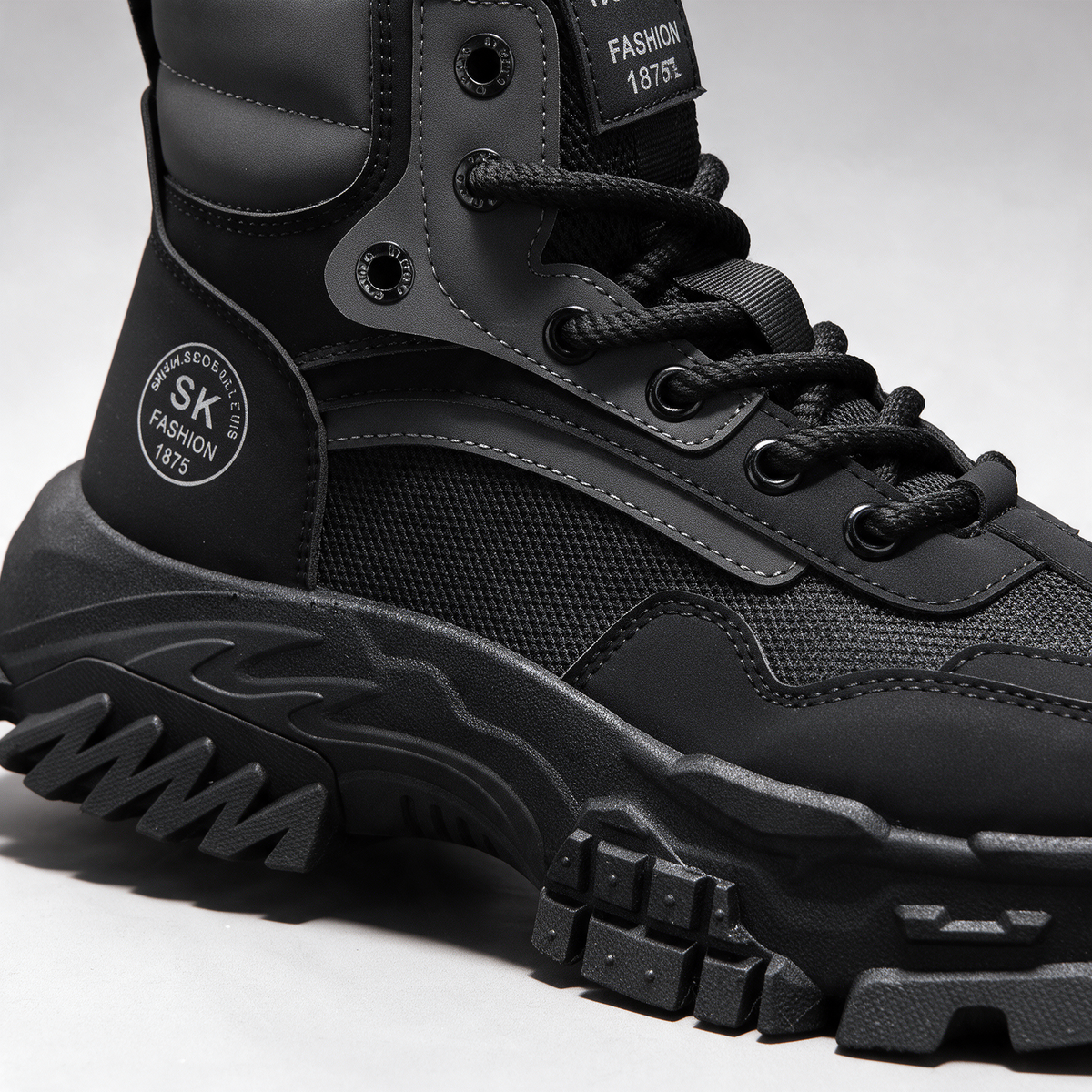 Black mesh-panel lace-up boot — feature2