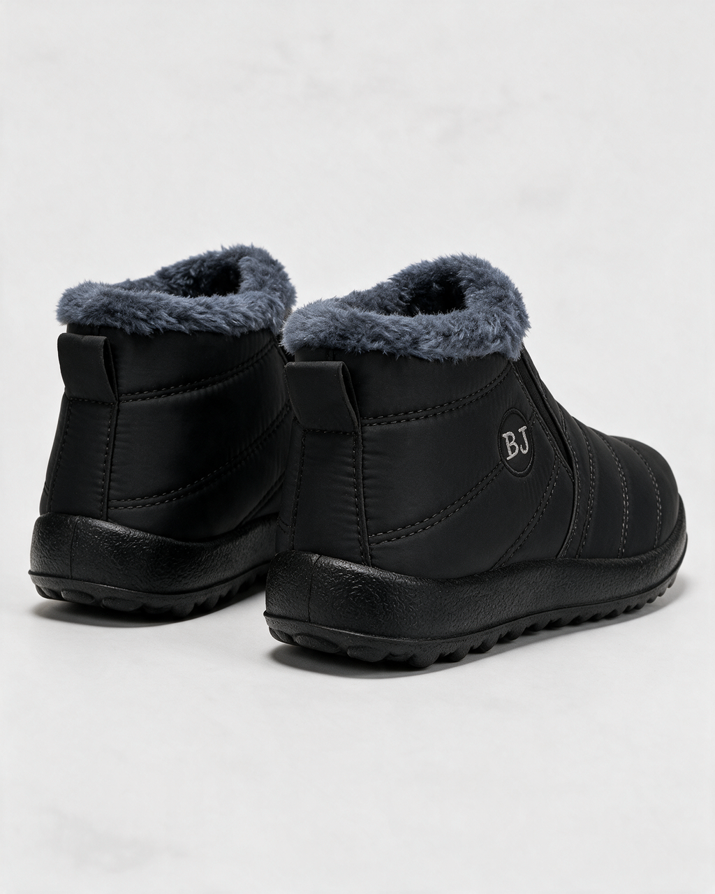 Black plush-lined ankle boots rear