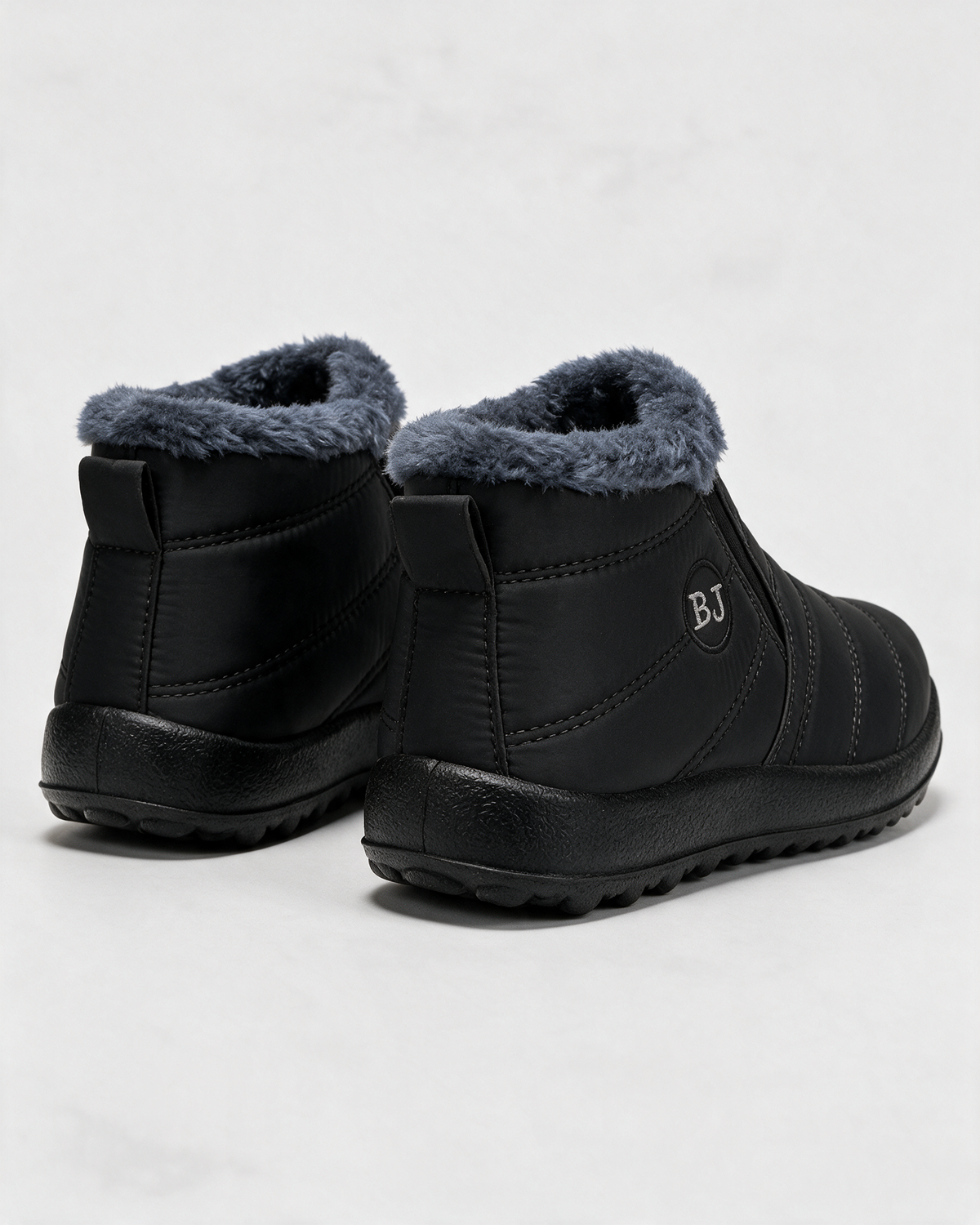 Black plush-lined ankle boots rear