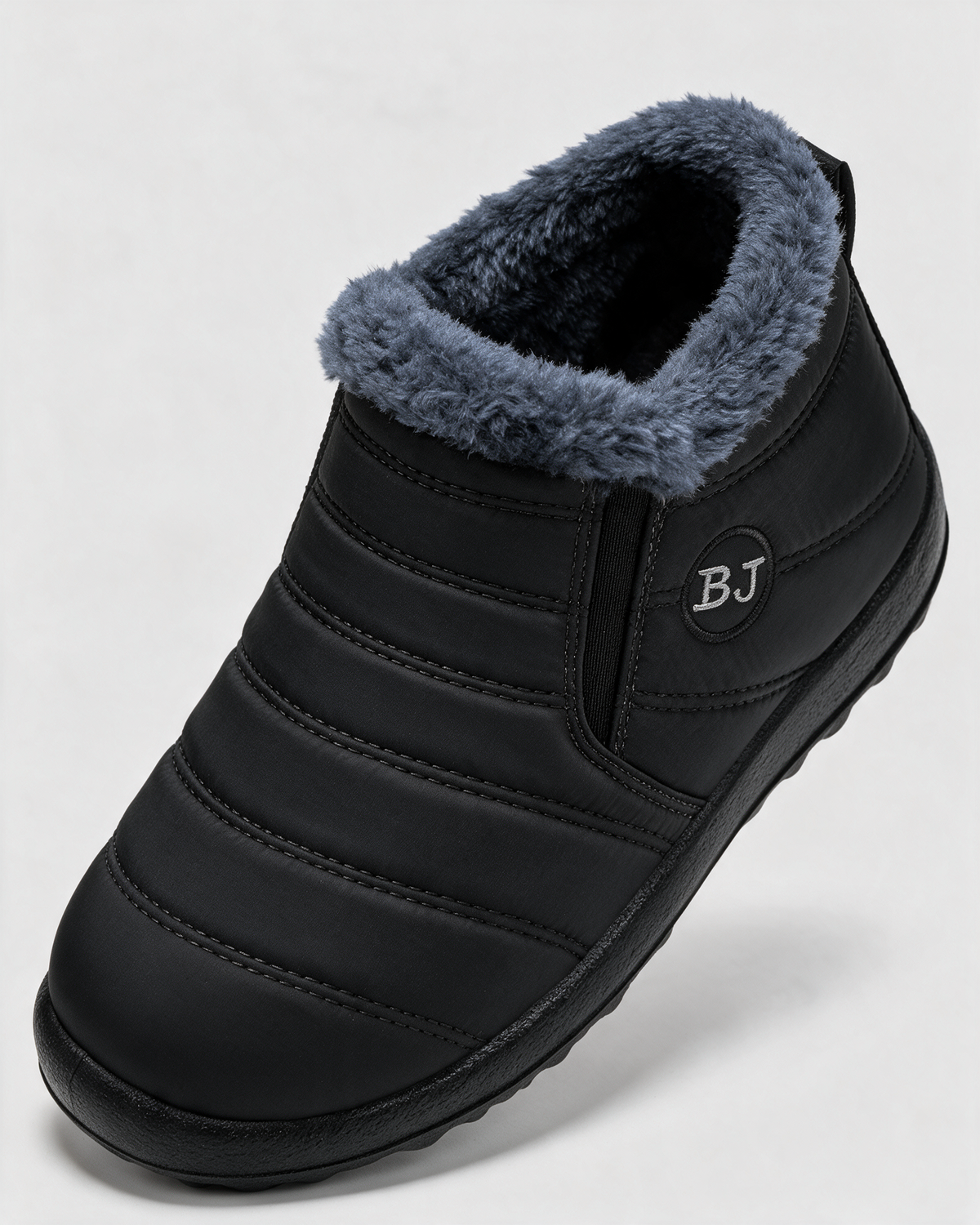 Black plush-lined ankle boots opening