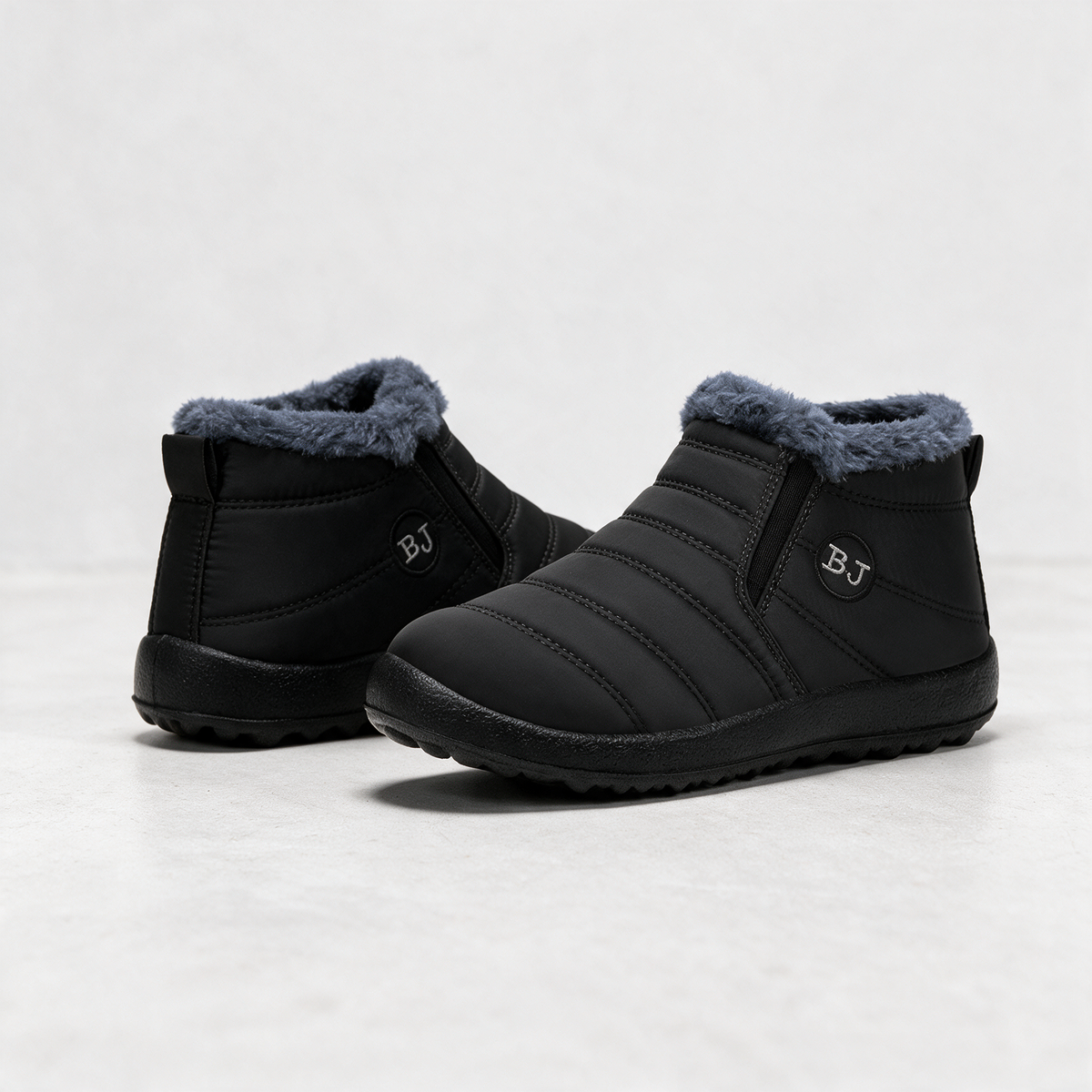Black plush-lined ankle boots feature1