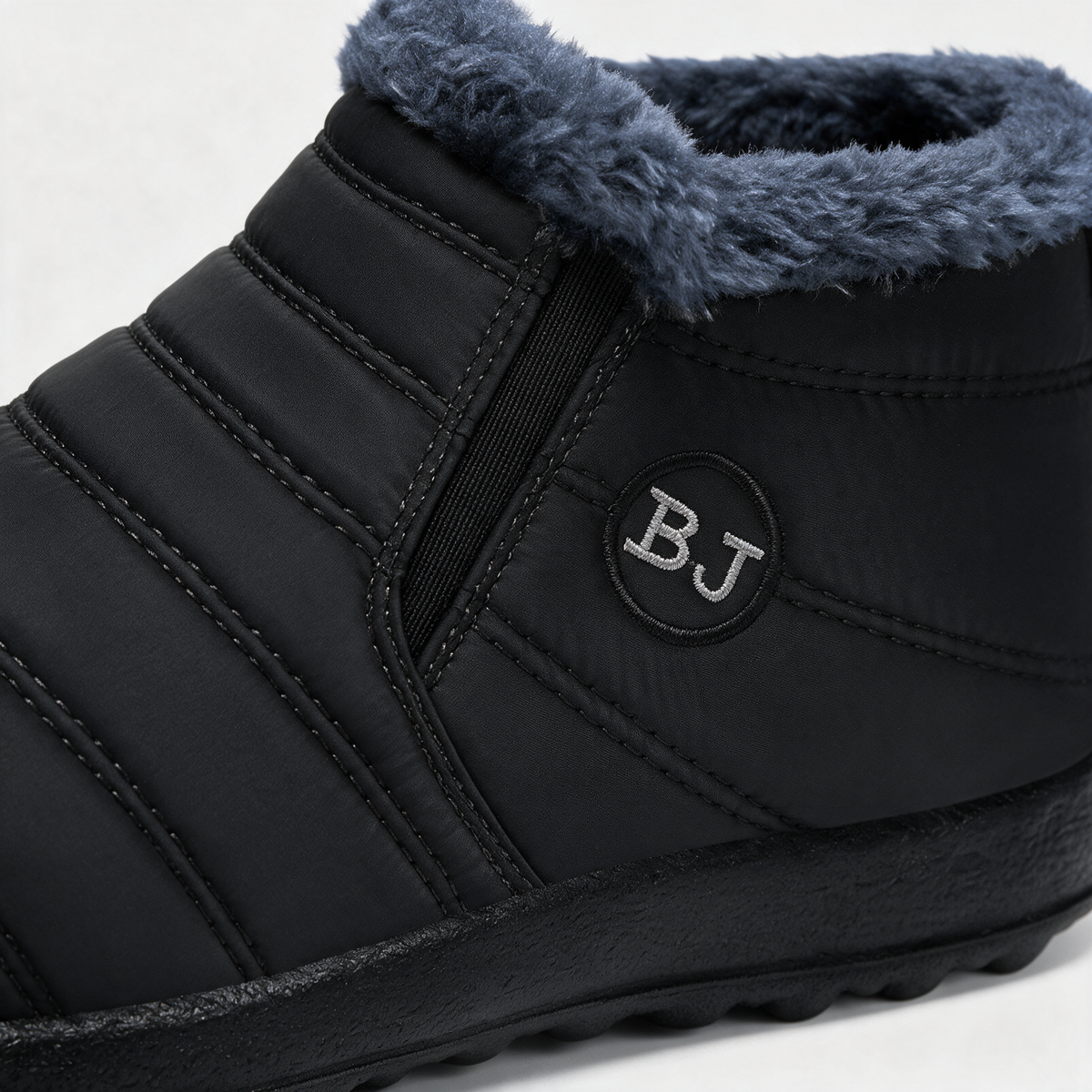 Black plush-lined ankle boots feature3