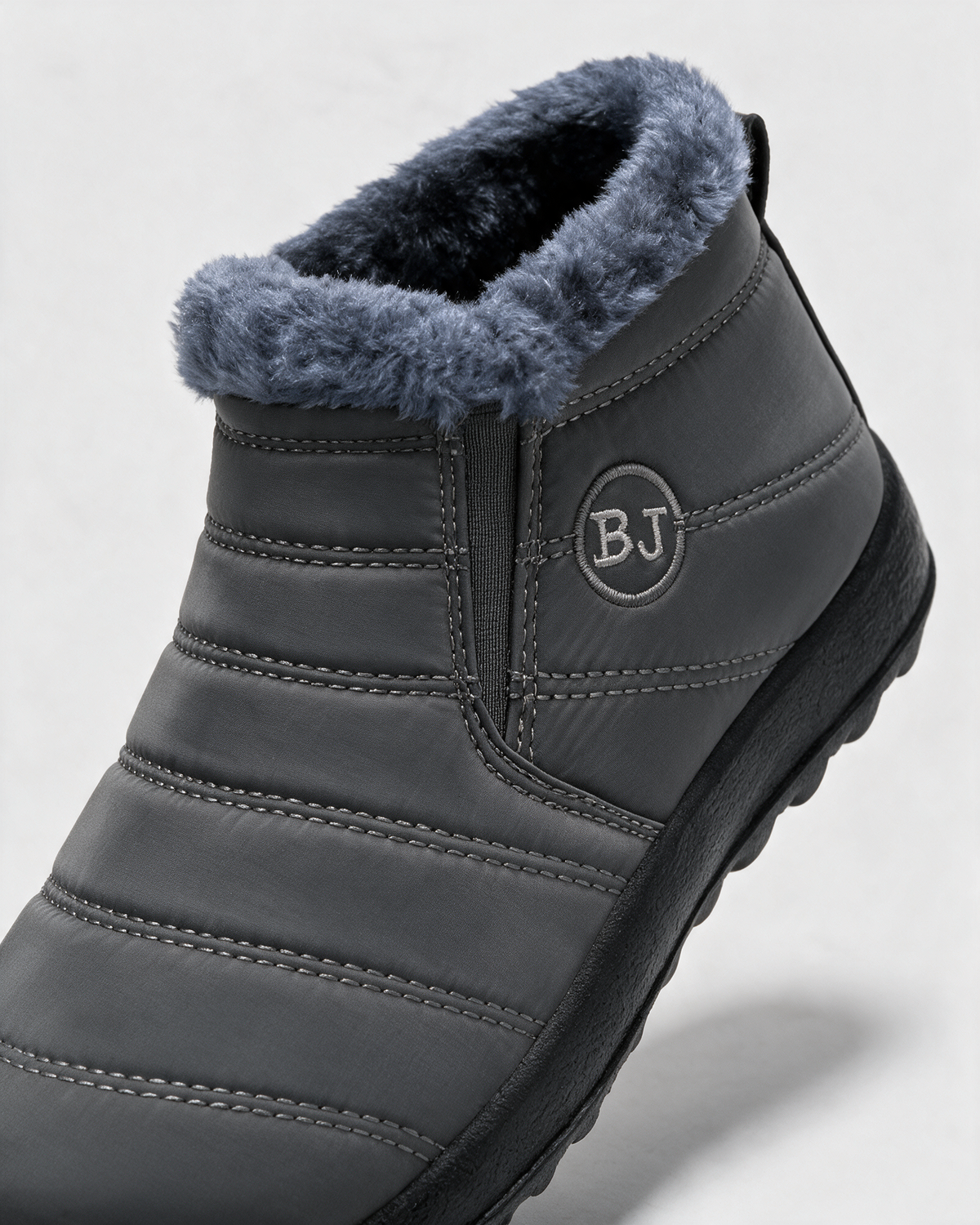Gray plush-lined ankle boots opening