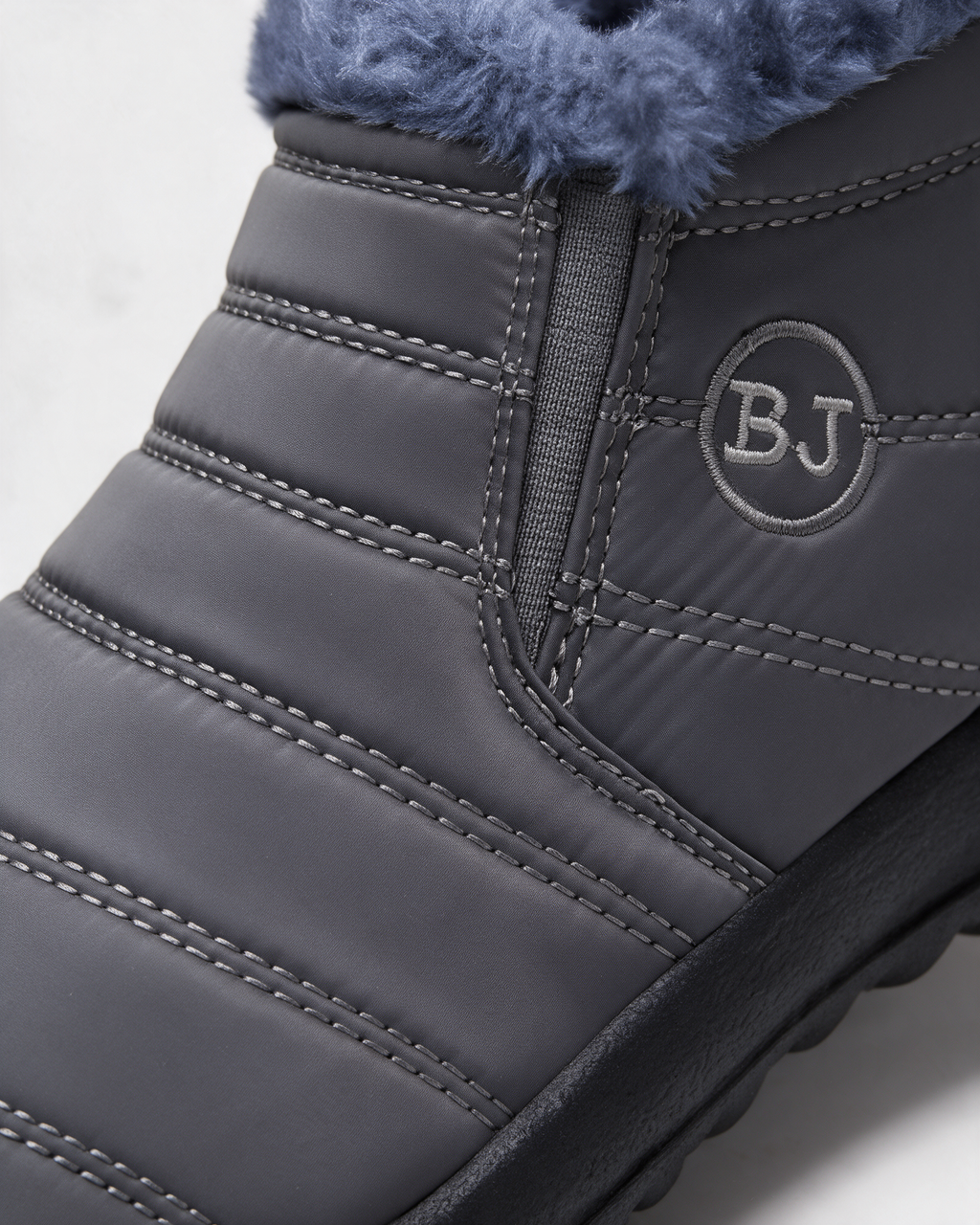 Gray plush-lined ankle boots material