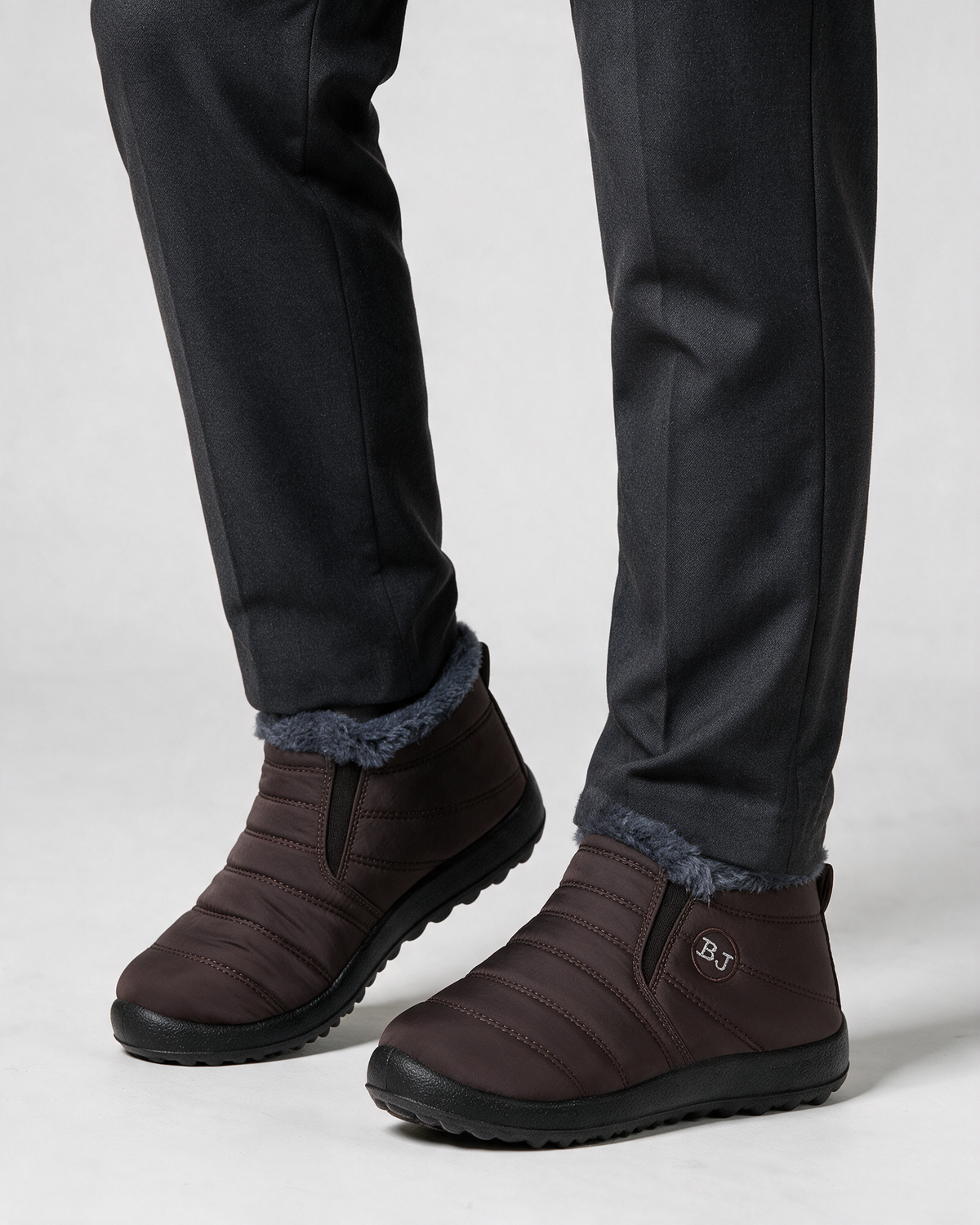 Brown plush-lined slip-on ankle boots wearing