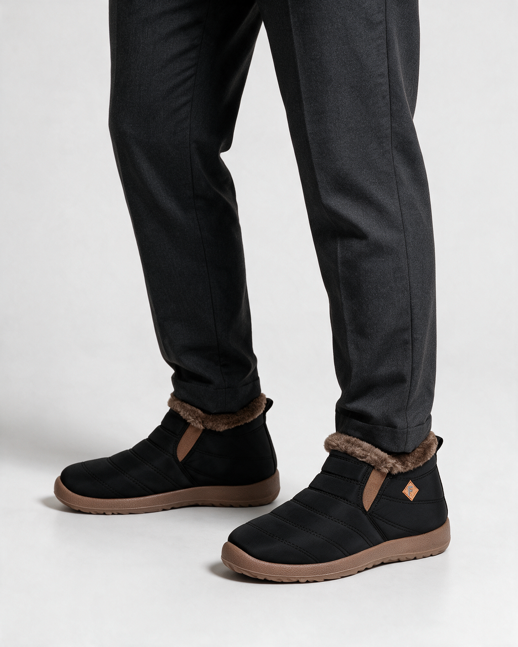 Black ankle boots with brown trim — wearing