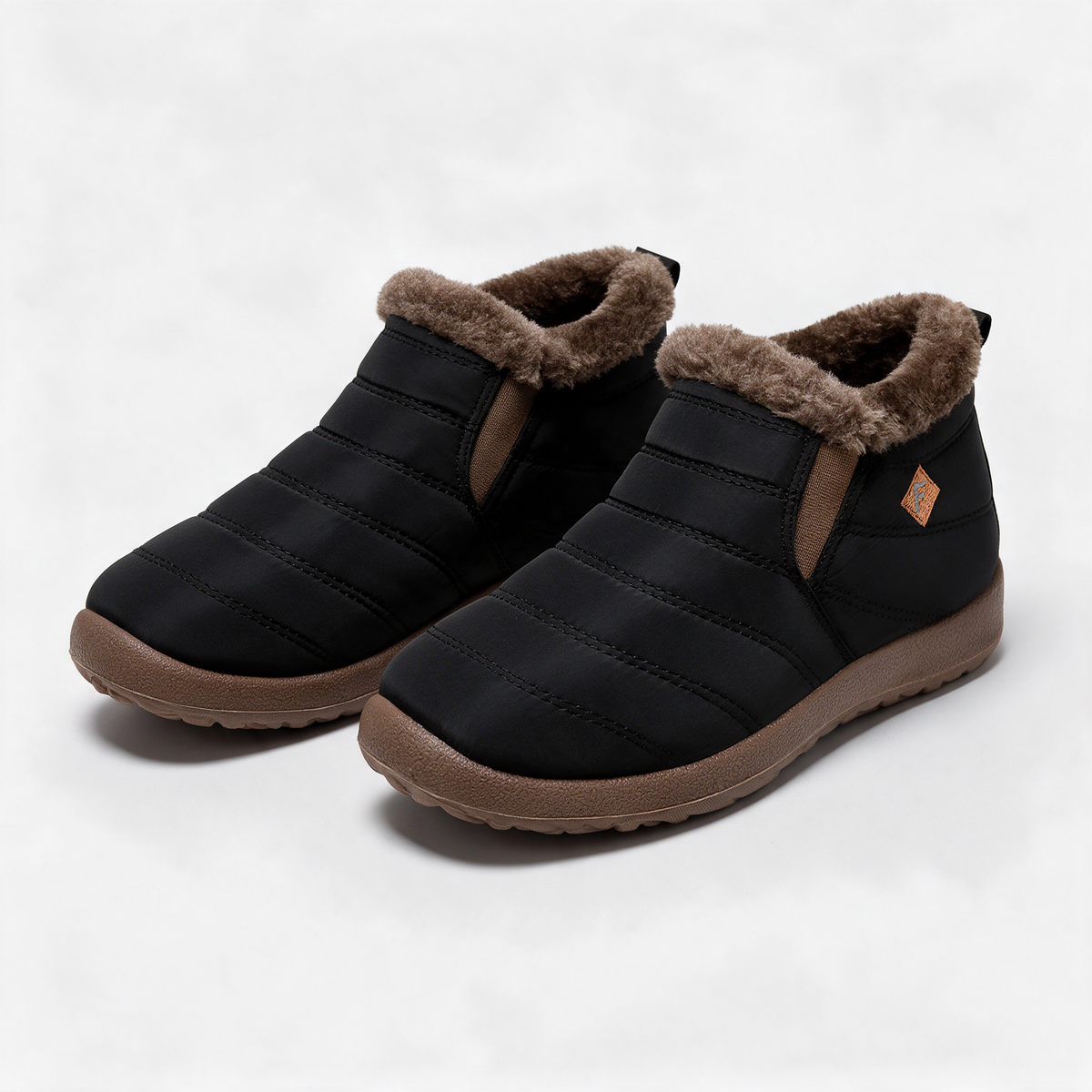 Black brown-trim boots — feature1