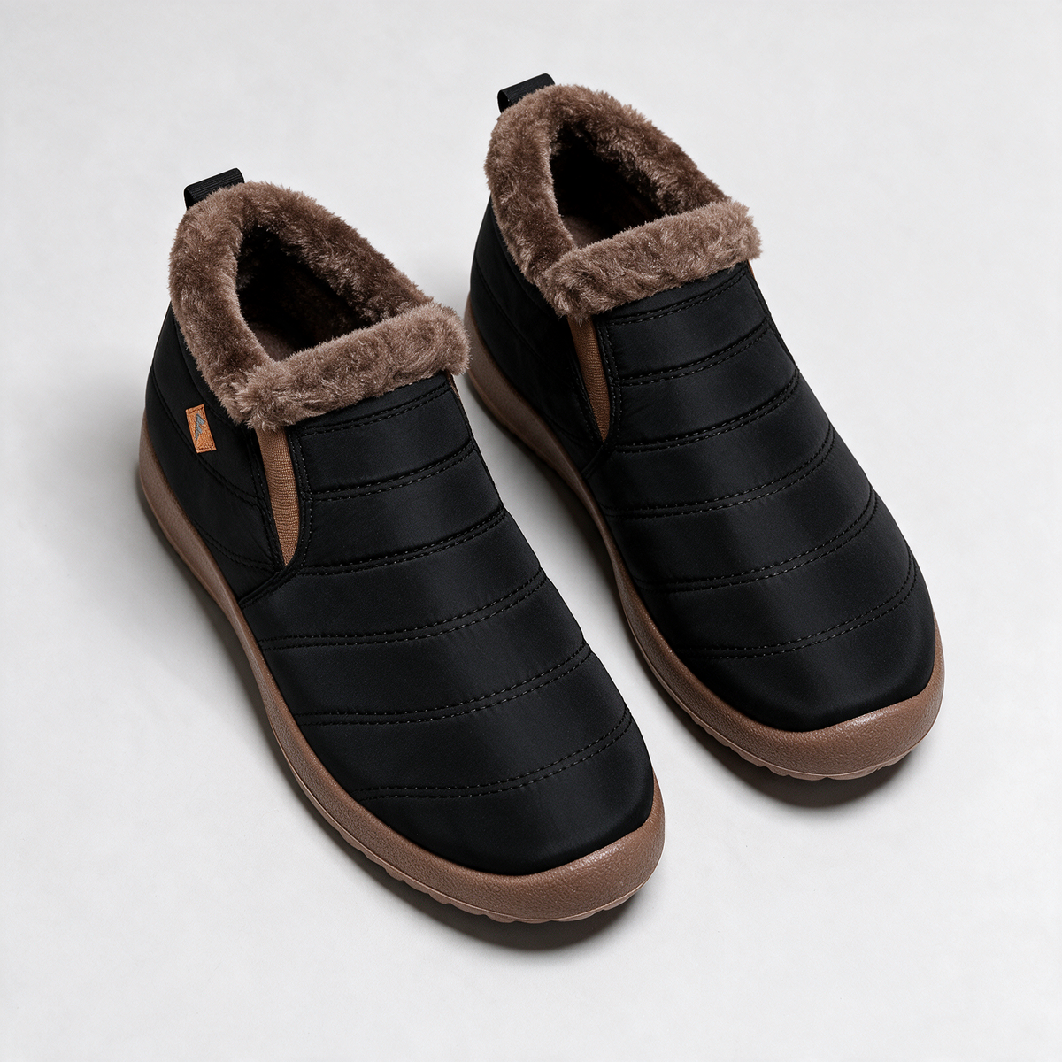 Black brown-trim boots — feature2