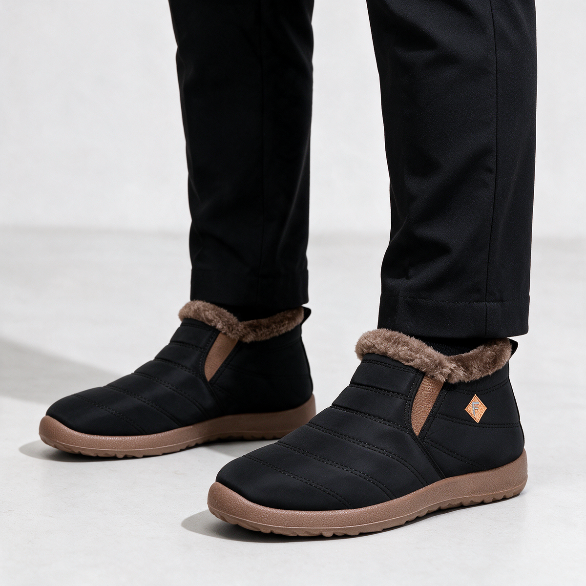 Black brown-trim boots — feature5