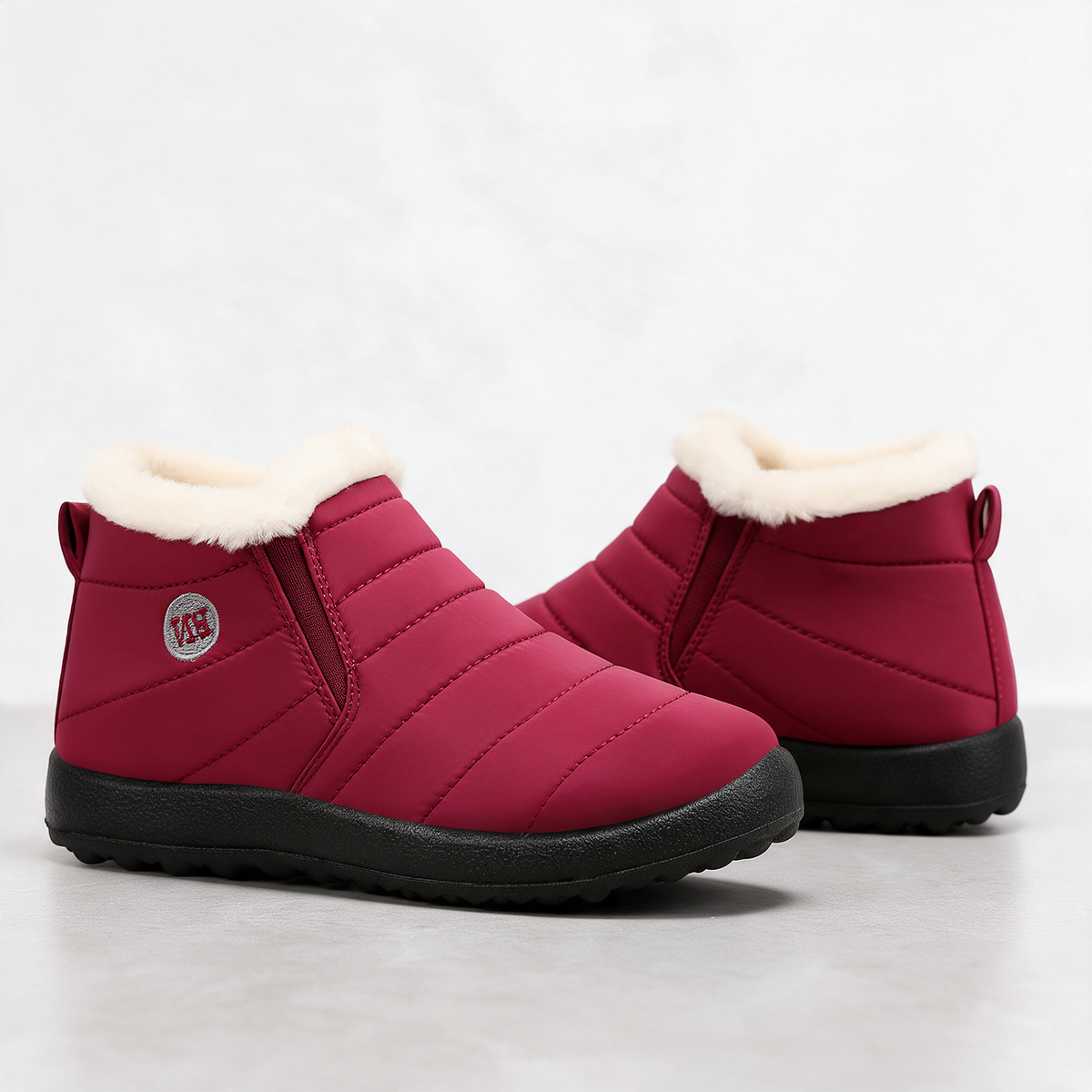 Red and ivory slip-on ankle boots