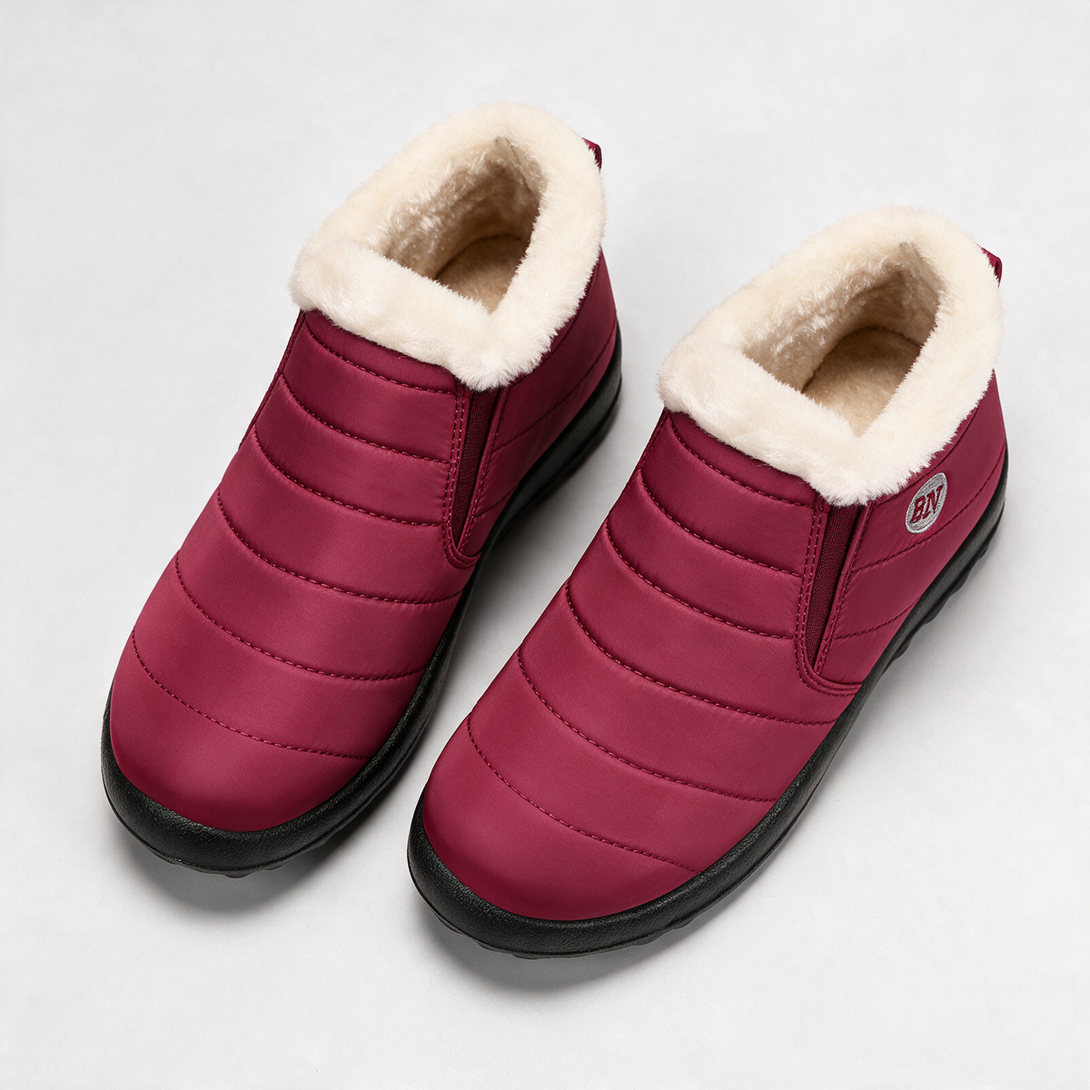 Red and ivory slip-on ankle boots