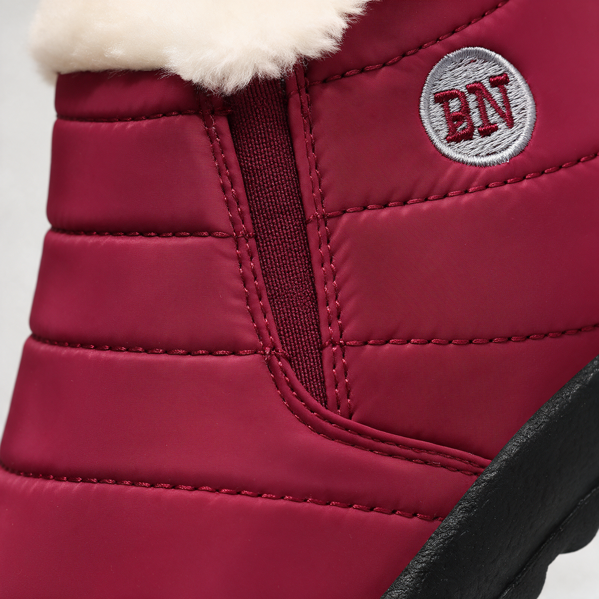 Red and ivory slip-on ankle boots
