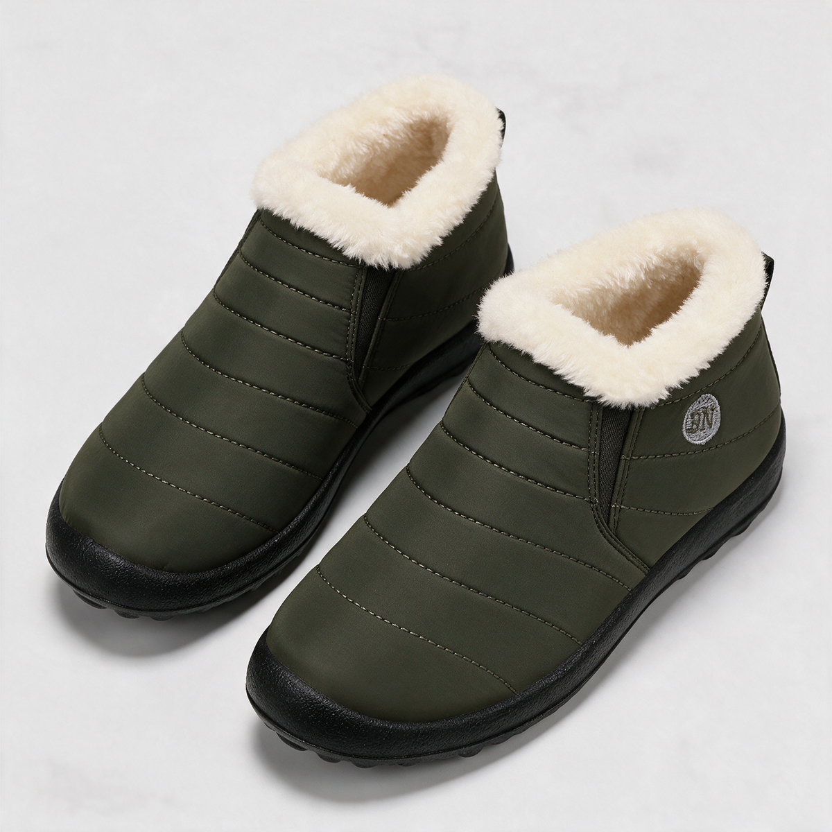 Olive and ivory slip-on ankle boots