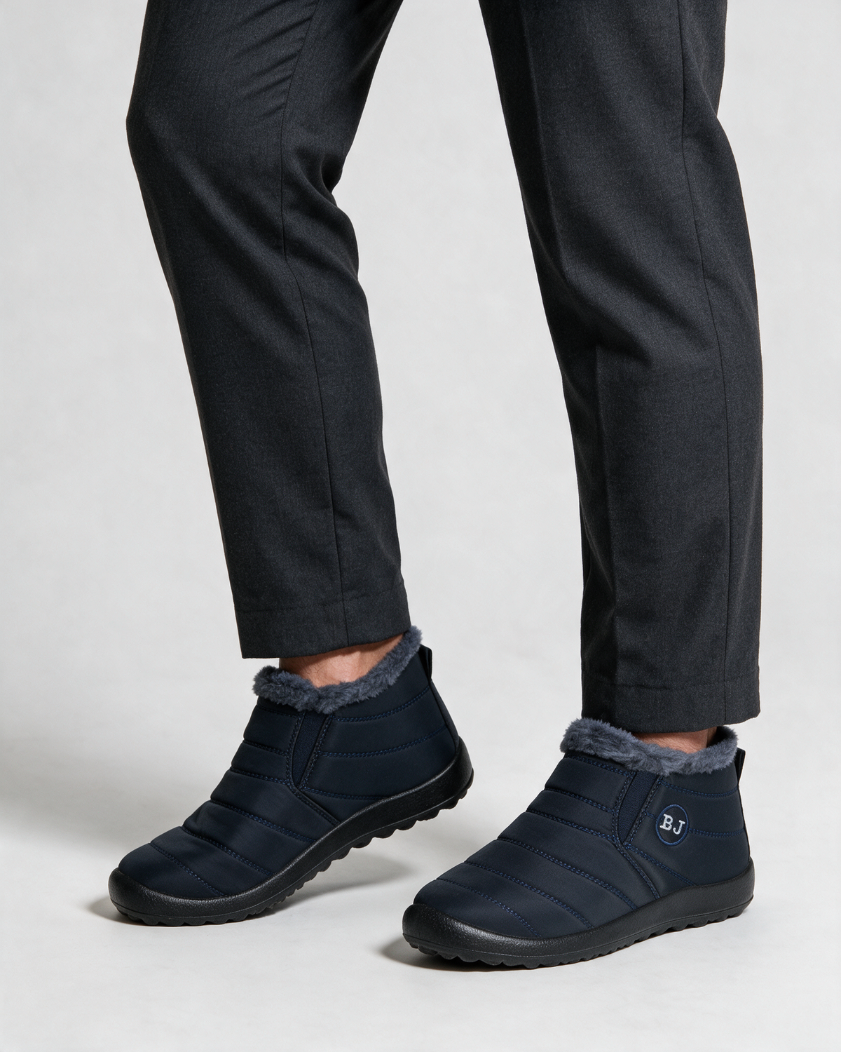 Navy plush-lined boots wearing
