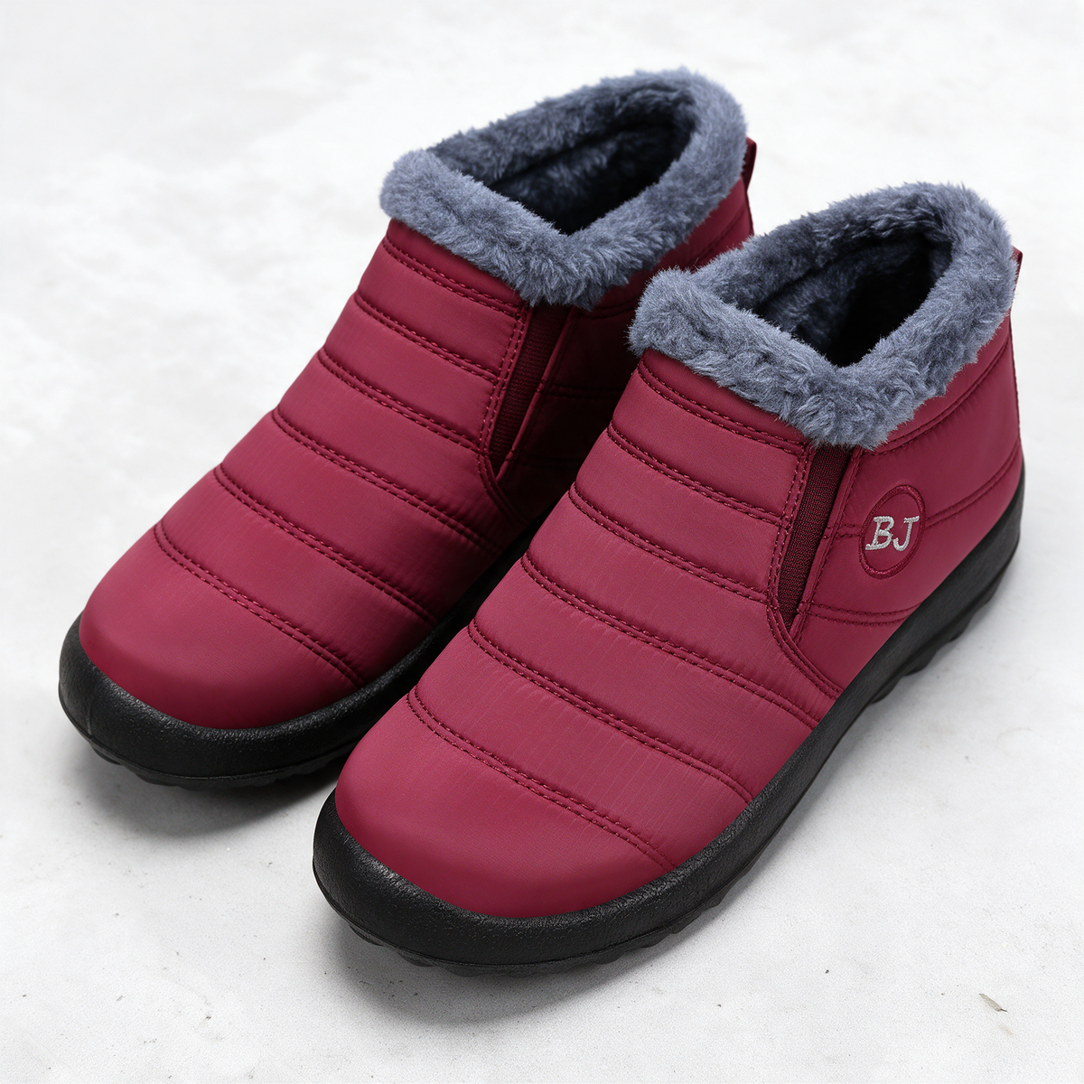 Plush-lined ankle boots pair detail