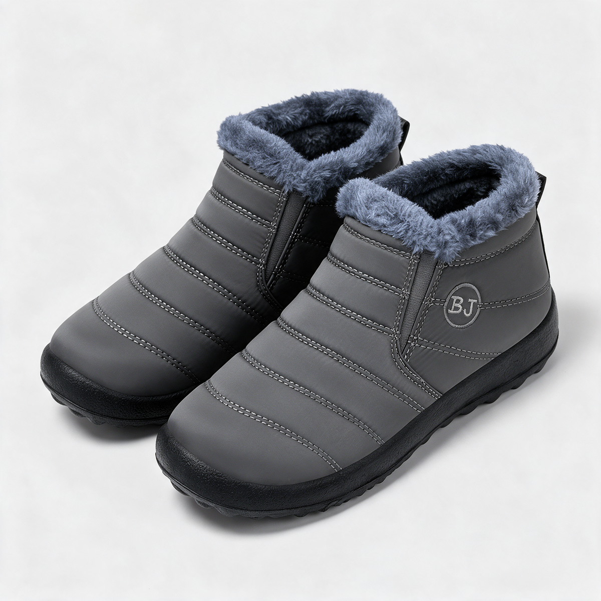 Plush-lined ankle boots pair detail