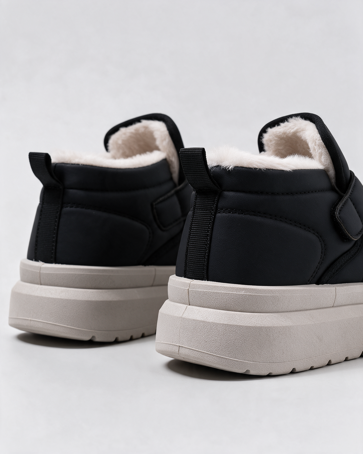 Plush-collar strap boots — product and editorial photography