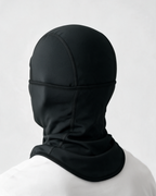 Black fleece-lined balaclava — rear view on light gray