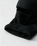 Black fleece-lined balaclava — fleece lining detail on light gray