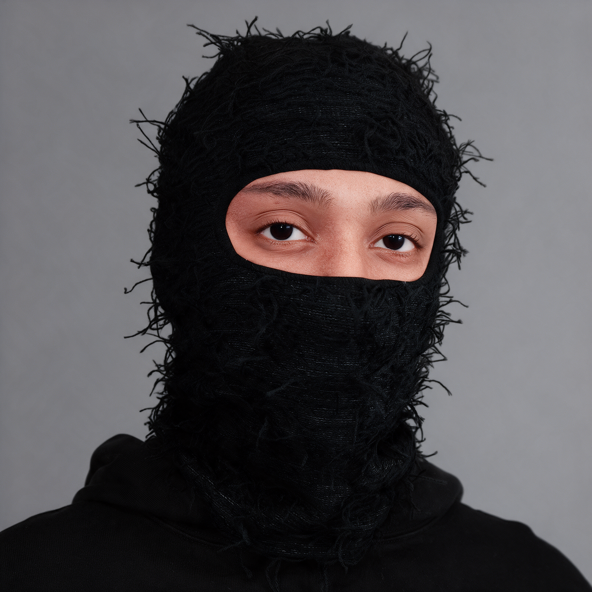 Black distressed knit balaclava feature detail