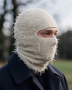 Beige distressed-knit balaclava detail