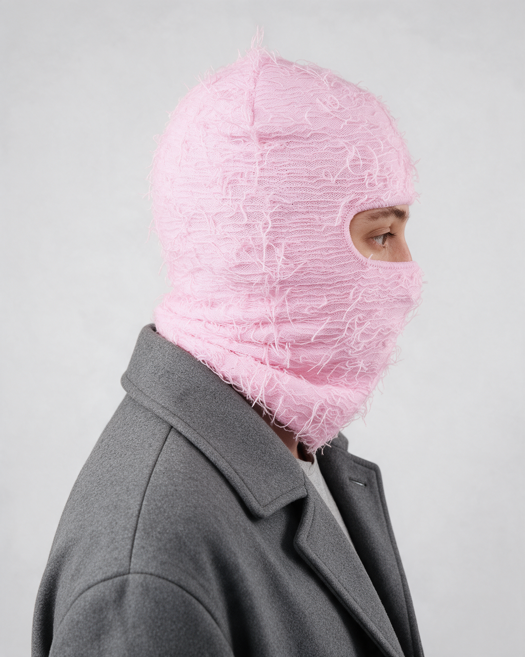 Pink distressed-knit balaclava — side and rear view