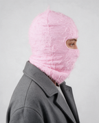 Pink distressed-knit balaclava — side and rear view