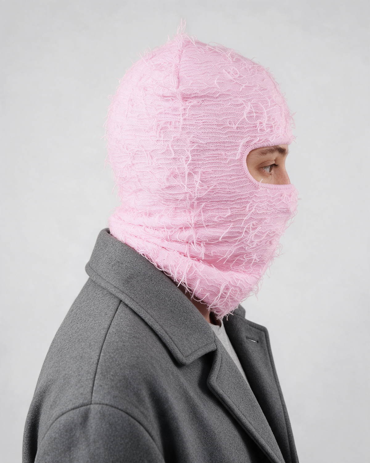 Pink distressed-knit balaclava — side and rear view