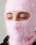 Pink distressed-knit balaclava — eye opening detail