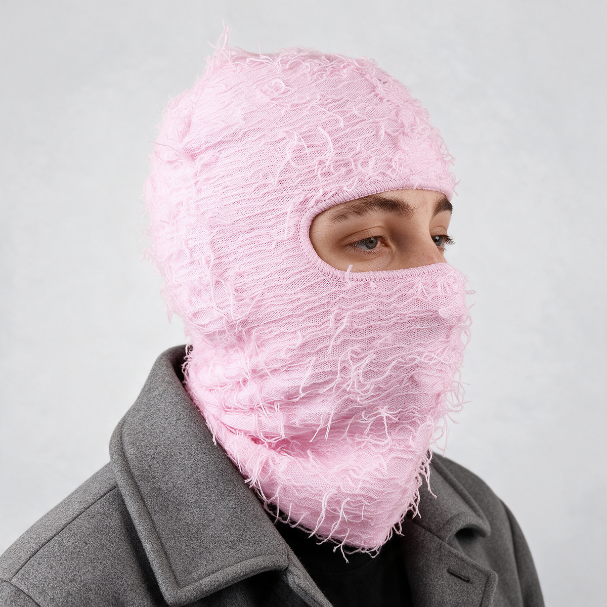 Pink distressed-knit balaclava — head and neck coverage