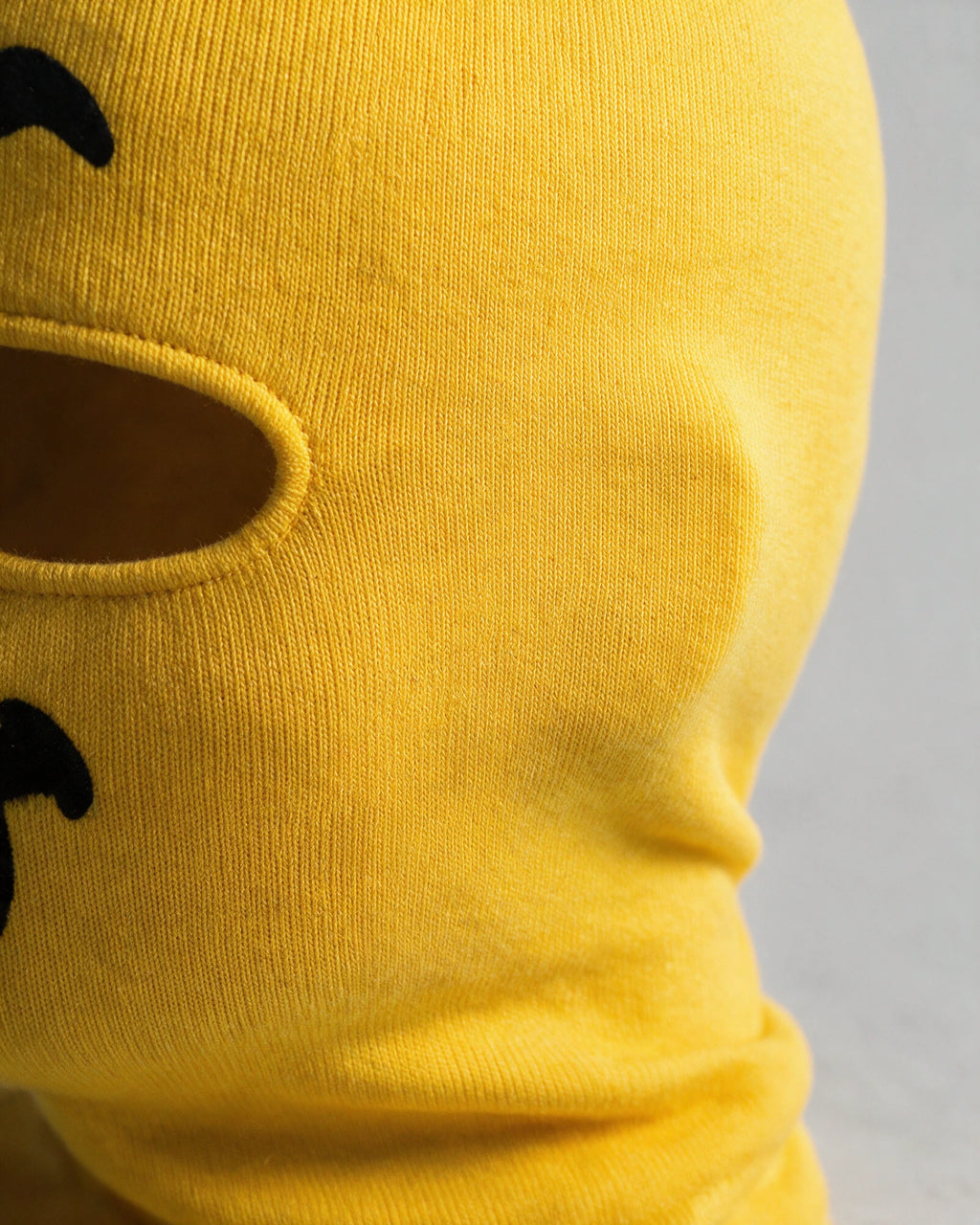 Printed fabric mask detail. Goggles and clothing not included.