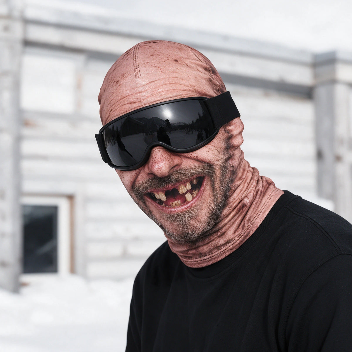 Printed fabric mask worn with ski goggles. Goggles and clothing not included.