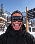 Tongue Out printed mask styled with ski goggles