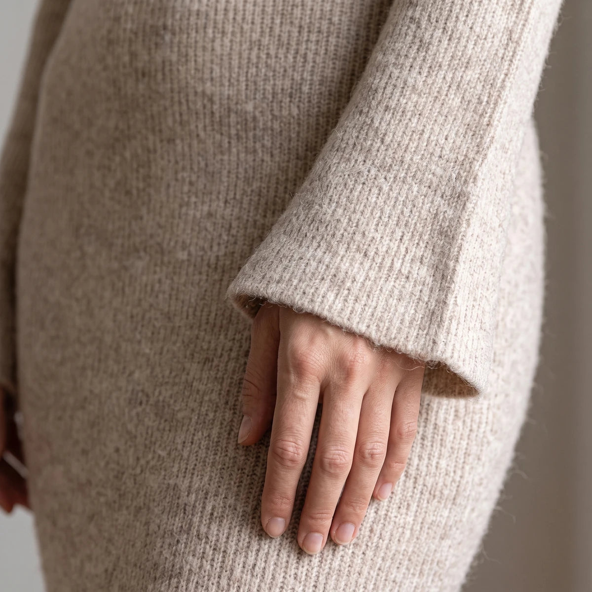 Beige off-shoulder clasp-detail knit midi dress