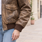 Women's Cassidy Oversized Leather Bomber Jacket — Brown — sleeve-detail