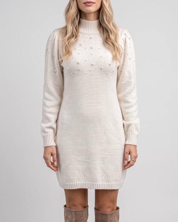 Ivory pearl-embellished sweater dress on a light gray background