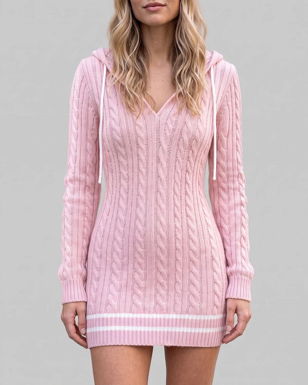 Pink hooded cable-knit sweater dress on a light gray background