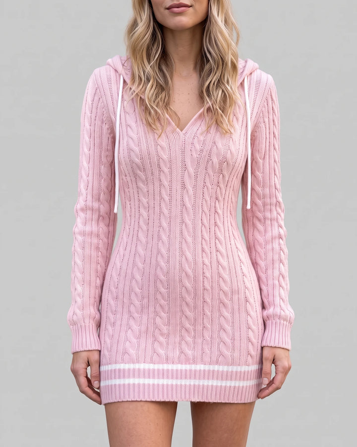 Pink hooded cable-knit sweater dress on a light gray background