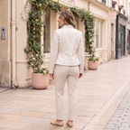 Women's Stitched-Lapel Faux Leather Biker Jacket — White — rear on-model view