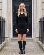 Women's V-Neck Ribbed Mini Sweater Dress in Black — full front view