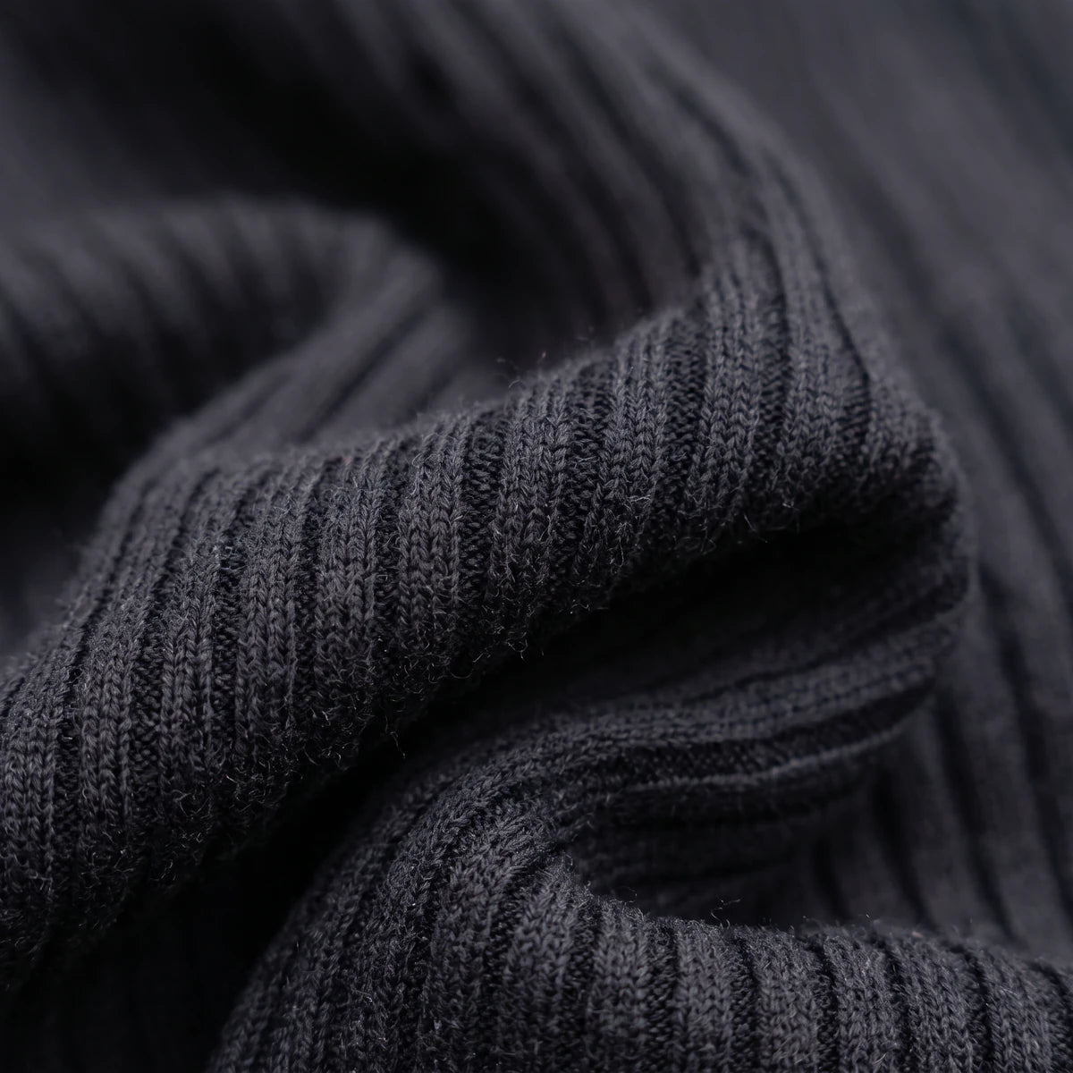Women's V-Neck Ribbed Mini Sweater Dress in Black — knit detail