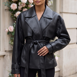 Women's Belted Faux Leather Short Trench Jacket in Black – front on model