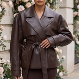 Women's Belted Faux Leather Short Trench Jacket in Coffee Brown – front on model