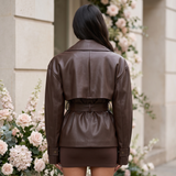 Women's Belted Faux Leather Short Trench Jacket in Coffee Brown – back on model