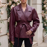 Women's Belted Faux Leather Short Trench Jacket in Purple Red – front on model